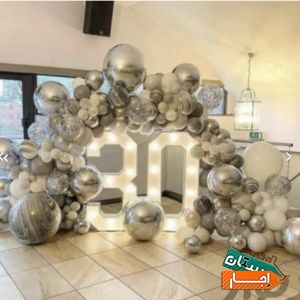 اجاره دکور و لوازم تولد، بادکنک آرایی، میز استوانه بک بال فرشته با بهترین شرایط