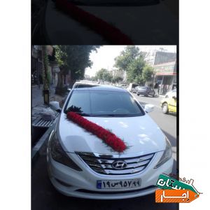 اجاره ماشین عروس سوناتا با گل ودسته گل