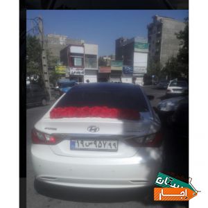 اجاره ماشین عروس سوناتا با گل ودسته گل