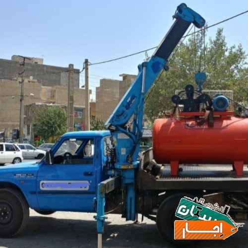اجاره جرثقیل نیسان جابجایی دستگاه با جک پالت