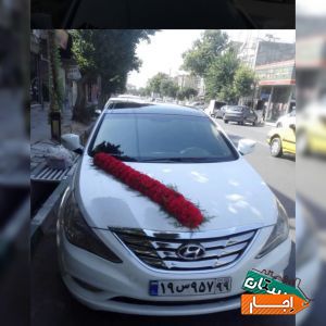 اجاره ماشین عروس سوناتا با گل ودسته گل