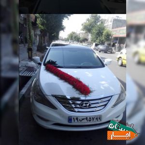 اجاره ماشین عروس سوناتا با گل ودسته گل